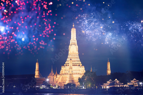 Wat Arun temple in bangkok with fireworks. New year and holiday concept.