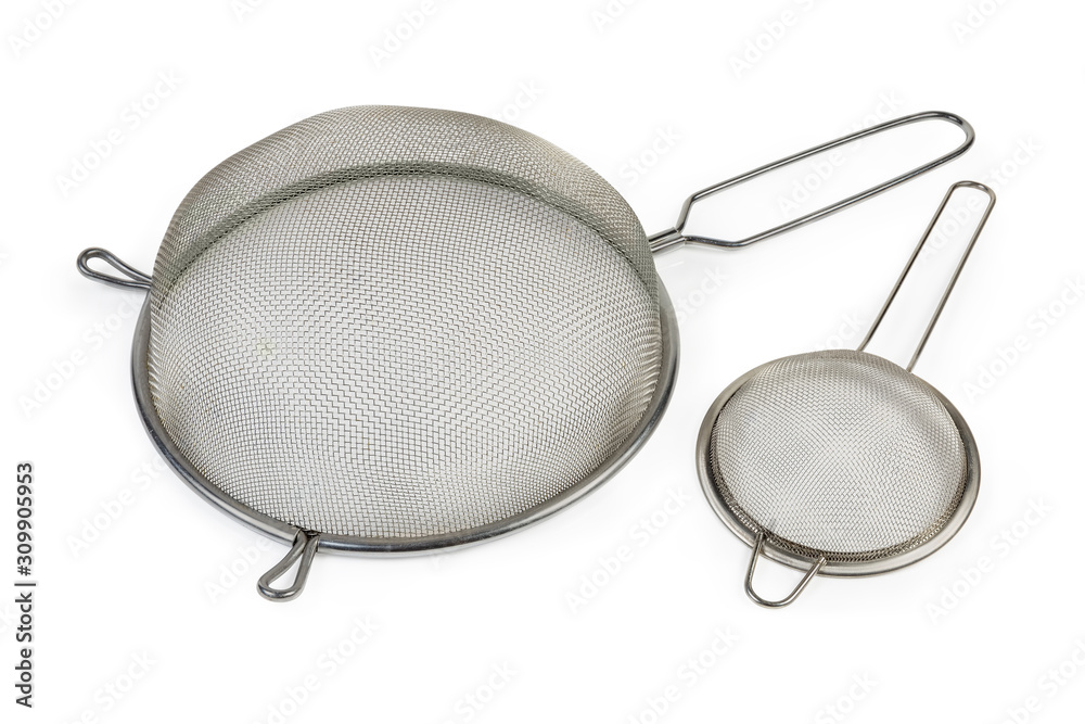 Two inverted round stainless steel sieve on a white background Two inverted round stainless steel sieve on a white background