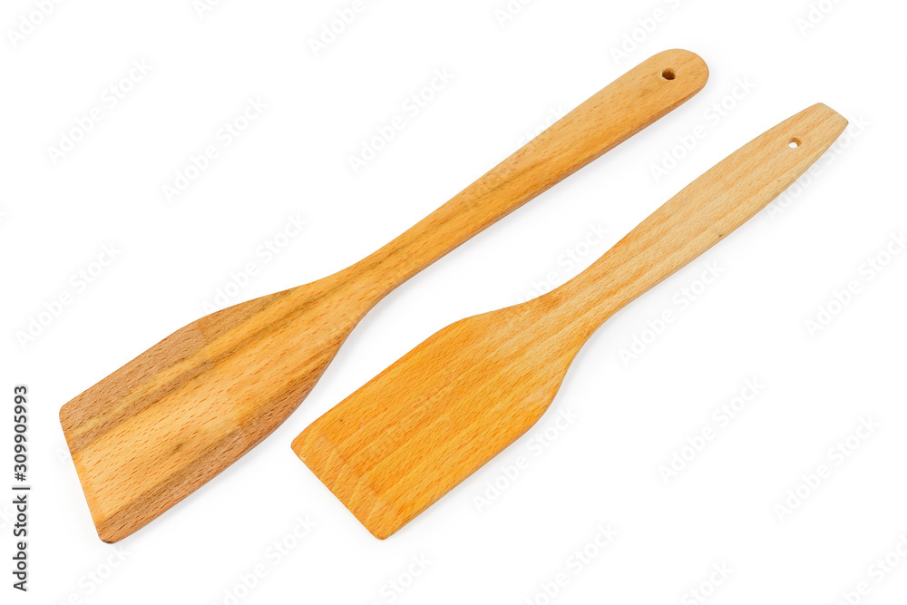 Two different wooden kitchen spatulas on a white background Two different wooden kitchen spatulas on a white background