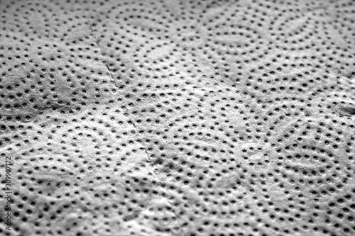 Paper towel surface with blur effect in black and white.