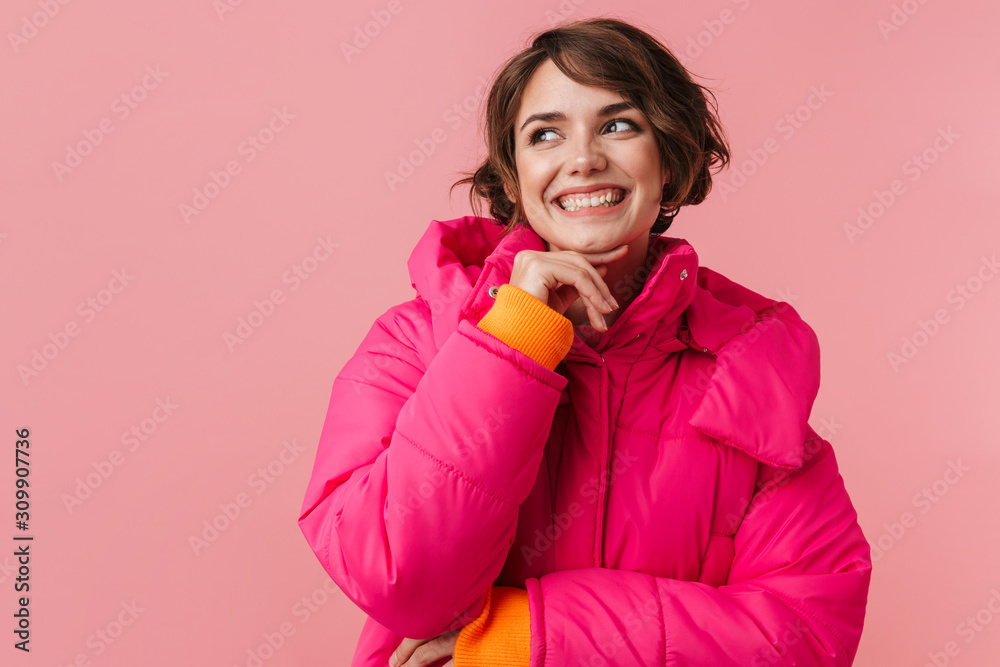 Portrait of beautiful pleased woman smiling and holding palms together Portrait of beautiful pleased woman smiling and holding palms together