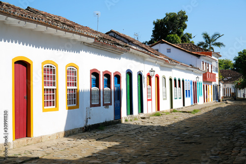 Typical house facades with colorful doors and windows in historic town Paraty, Brazil, Unesco World Heritage