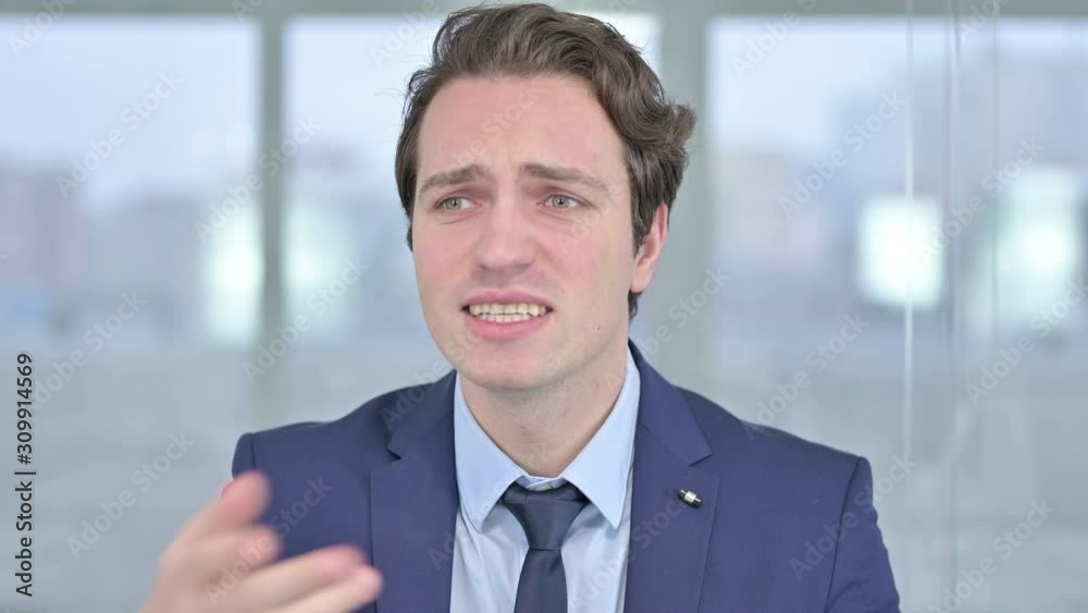 Portrait of Upset Young Businessman feeling Angry Portrait of Upset Young Businessman feeling Angry