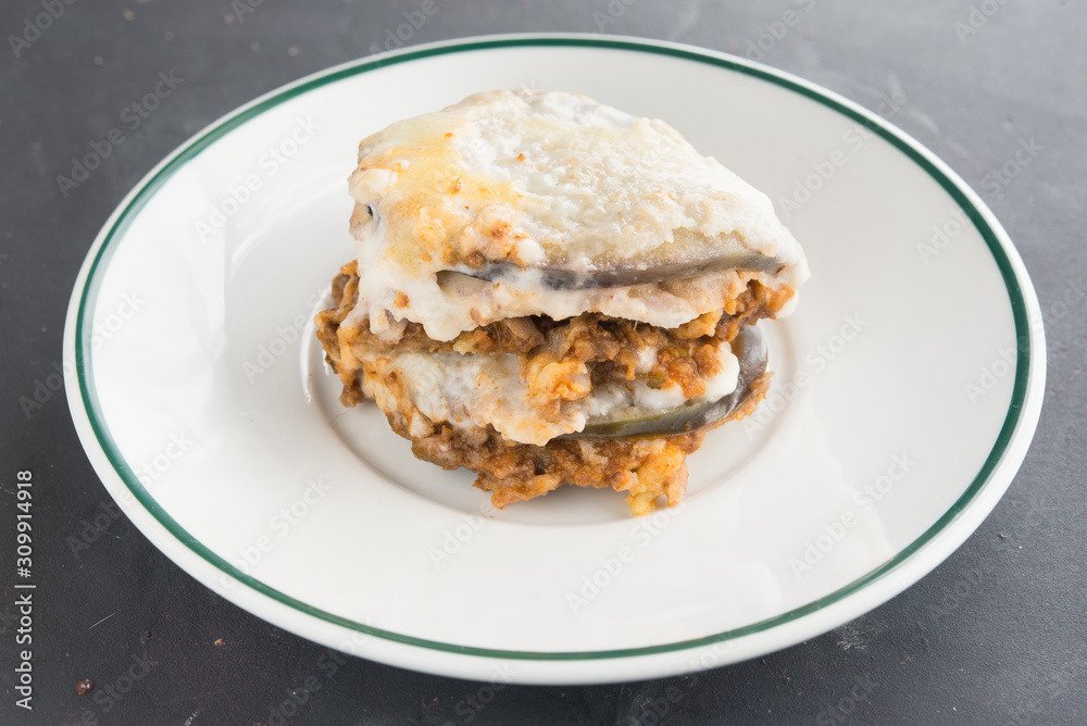 moussaka, eggplant of aubergine. In black background moussaka, eggplant of aubergine. In black background