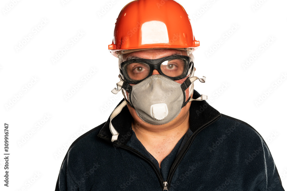 man with helmet, mask and goggles on white background man with helmet, mask and goggles on white background
