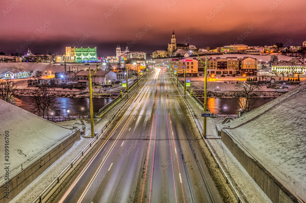 BELARUS, Grodno, January 3, 2019:  Night Grodno, road with cars, bridge with cars at night.