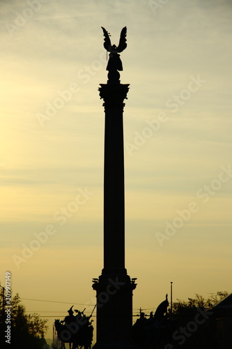 silhouette of Statues and sculptures in Heroes  square monument in sunset in Budapest Hungary
