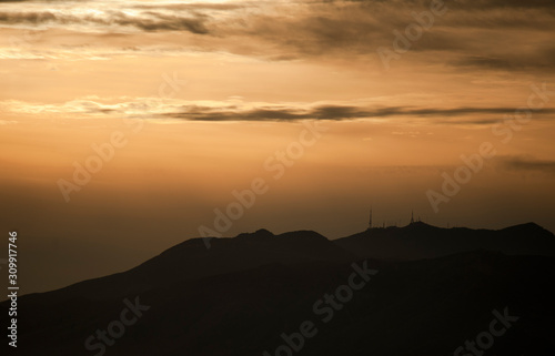 fantastic sunset with sky and mountains