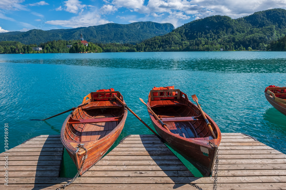 Pier with rent boats on a famous Bled lake in Slovenia.