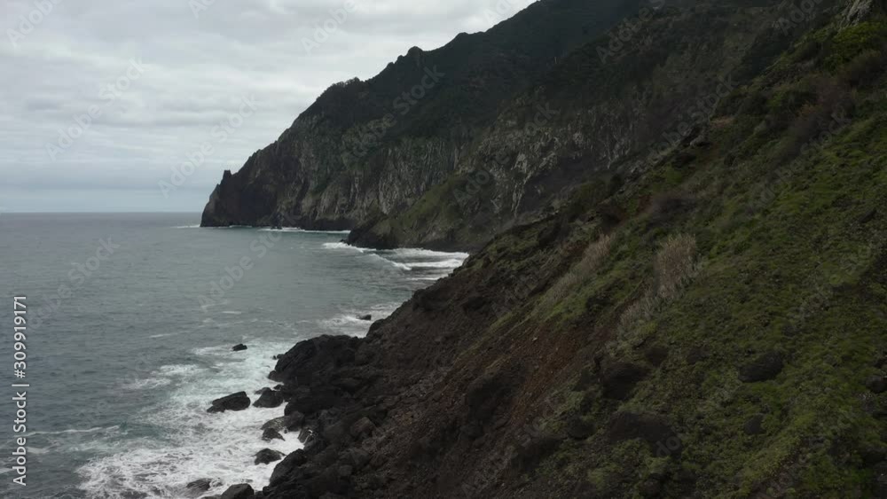 Aerial drone view of stone cliffs, ocean waves and oceanscape. Aerial drone view of stone cliffs, ocean waves and oceanscape.