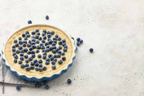 Blueberry pie or tart with fresh berries