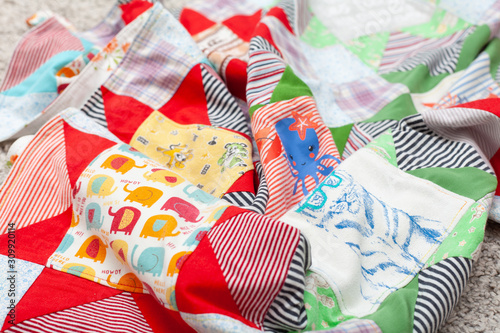 Patchwork, sewing with pieces of fabric, multi-colored segments.