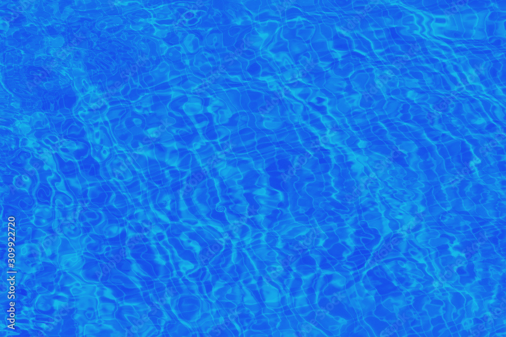 The texture of the water in the pool deep blue, background