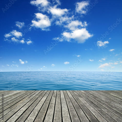  Sea water and and wooden table
