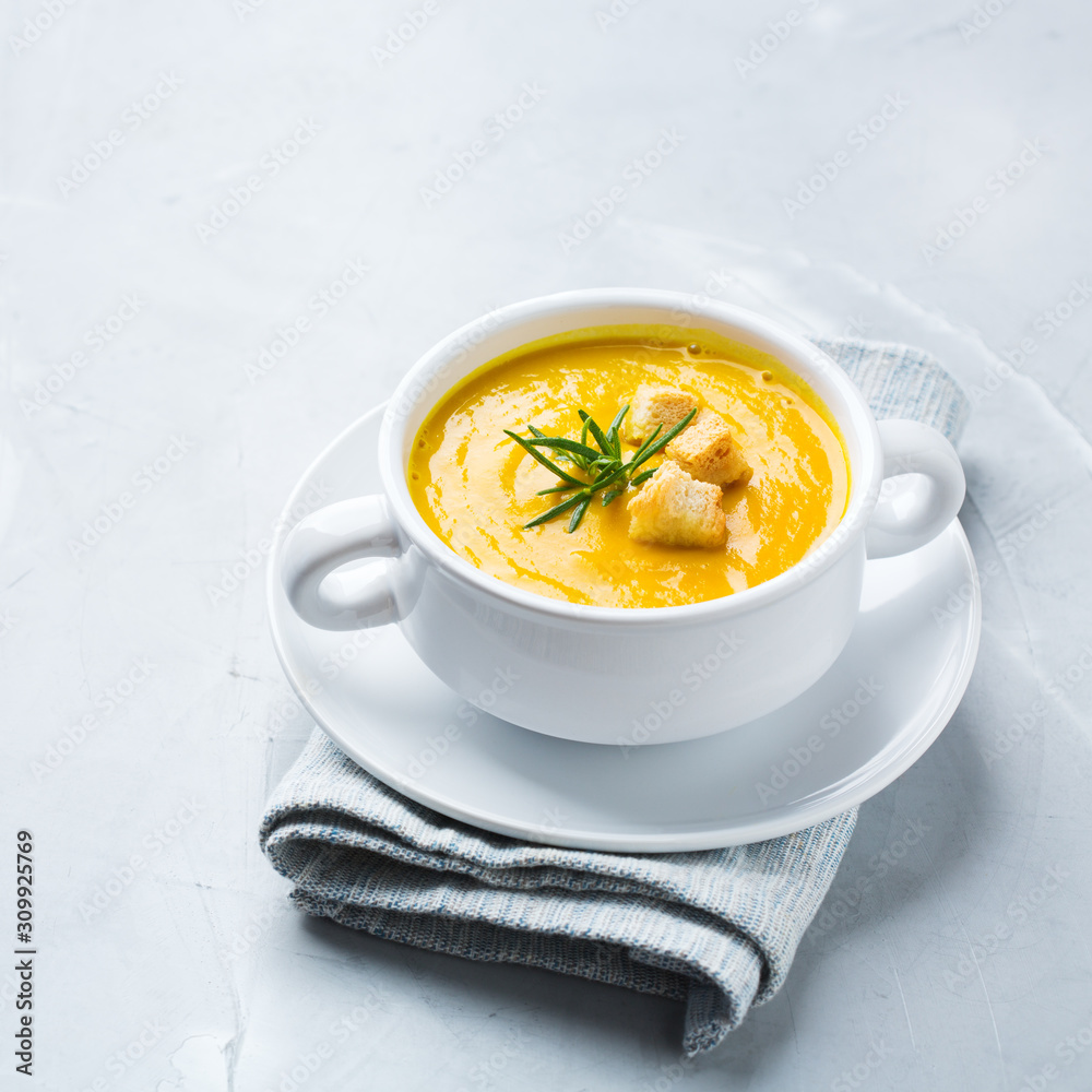 Seasonal spicy fall autumn creamy pumpkin and carrot soup Seasonal spicy fall autumn creamy pumpkin and carrot soup