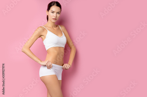 Perfect body of young woman wearing underwear. example of sports , fitness or plastic surgery. aesthetic cosmetology concept