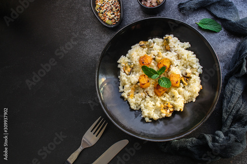 risotto mussels, vegetables (main course, rice seafood) menu concept. food background. top view. copy space