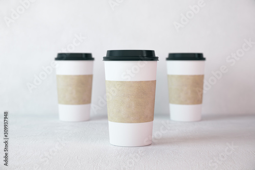 Three disposable paper cup