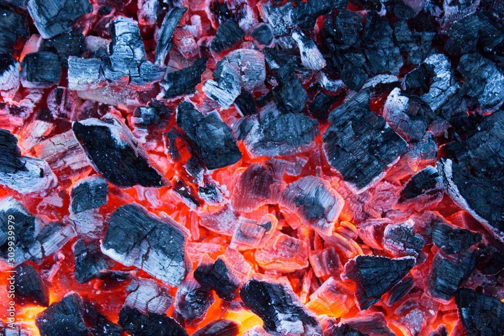 Smoldering charcoal, beautiful fiery background Smoldering charcoal, beautiful fiery background