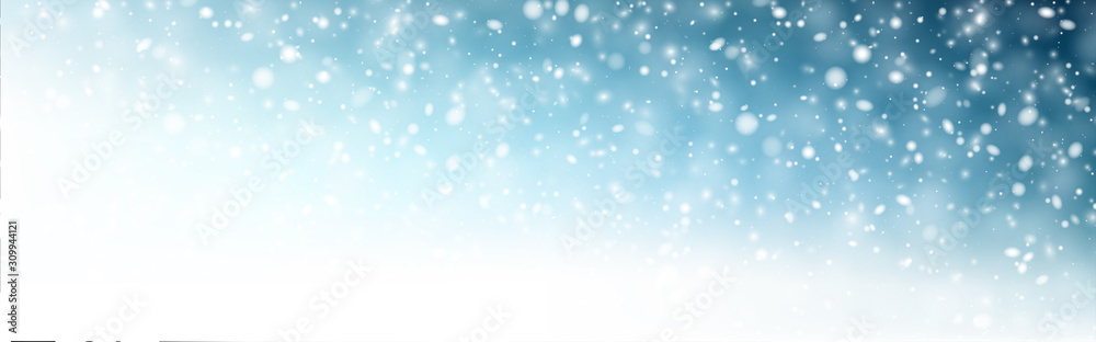 Winter blue horizontal background with white defocused snowflakes.