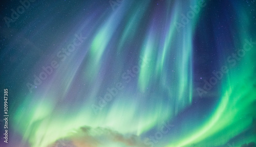 Northern lights  Aurora borealis with starry in the night sky