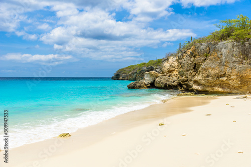 Little Knip beach - paradise white sand Beach with blue sky and crystal clear blue water in Curacao, Netherlands Antilles, a Caribbean tropical Island © Simon Dannhauer