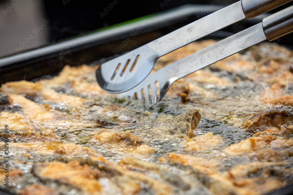 Obraz premium Delicious carp fillets roasted in the frying pan