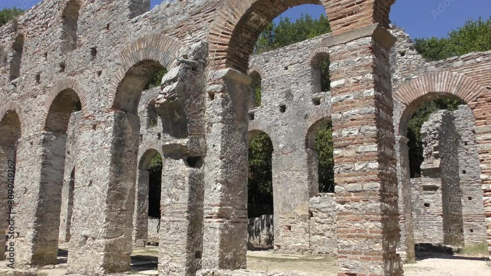 Impressions of the Ancient town Butrint (Buthrotum) - touristic attraction in Albania. Summertime traveling. Amazing original old town with fantastic stone architecture. Impressions of the Ancient town Butrint (Buthrotum) - touristic attraction in Albania. Summertime traveling. Amazing original old town with fantastic stone architecture.