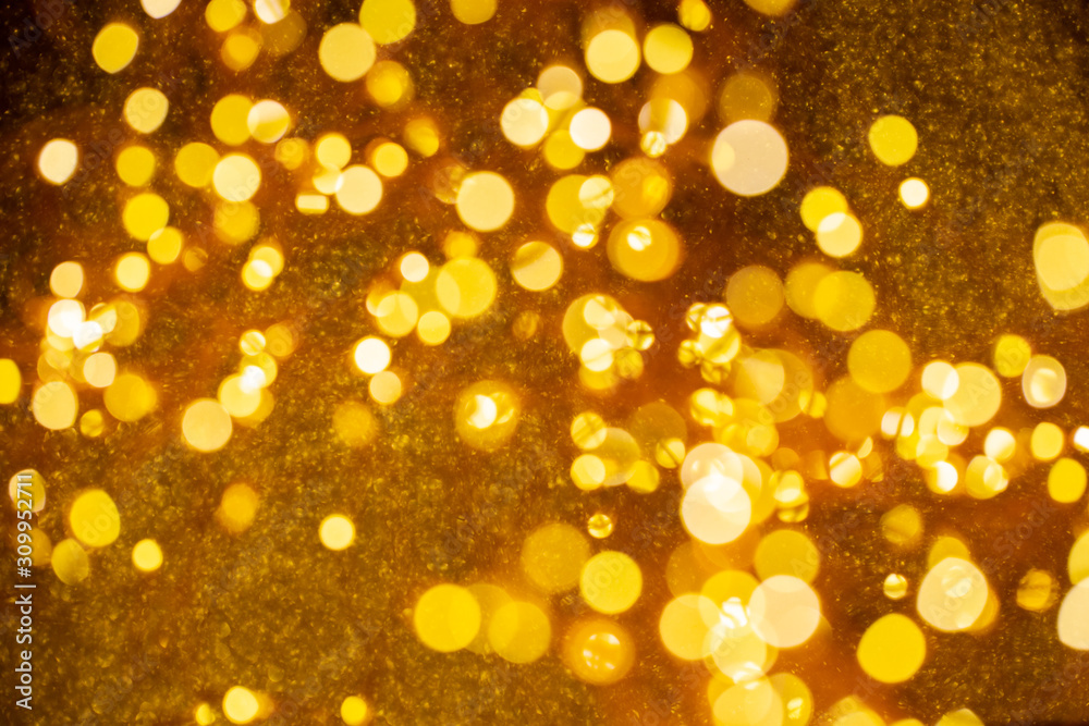 Christmas and Happy new year on blurred gold bokeh banner background. Christmas and Happy new year on blurred gold bokeh banner background.