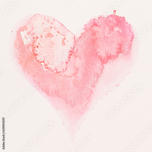 Watercolor painted pink heart, on the white watercolor paper.