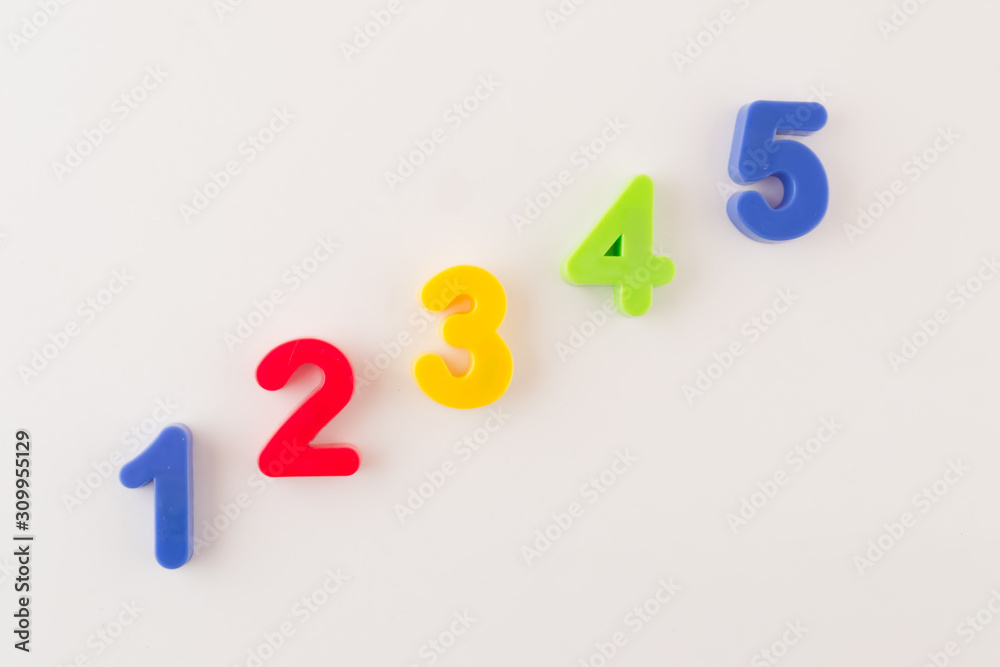 Colorful plastic numbers from one to five isolated on white background Colorful plastic numbers from one to five isolated on white background