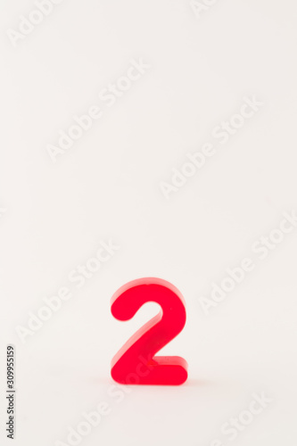 Red number two isolated on white background