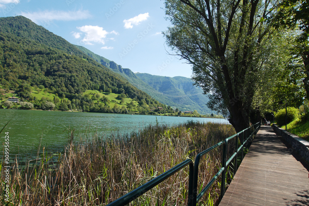 Footpath along Lake Endine, Province of Bergamo, Italy.