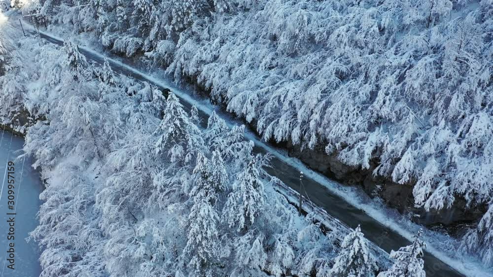 custom made wallpaper toronto digitalAerial view of car driving along icy road in winter