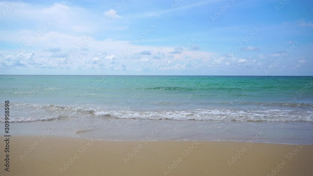 Beautiful tropical beach with blue sky and white cloud background. Summer vacation and nature environment concept. Beautiful tropical beach with blue sky and white cloud background. Summer vacation and nature environment concept.