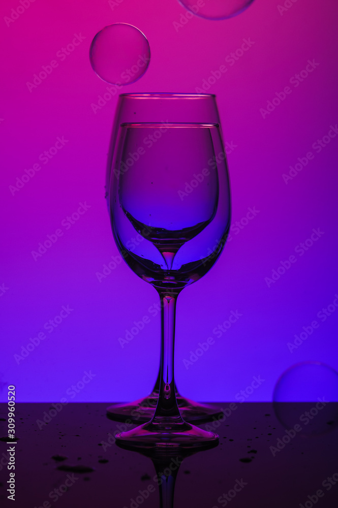 glass of wine on black background