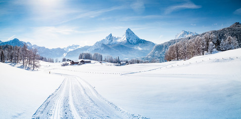Winter wonderland scenery with cross-country skiing track in the Alps