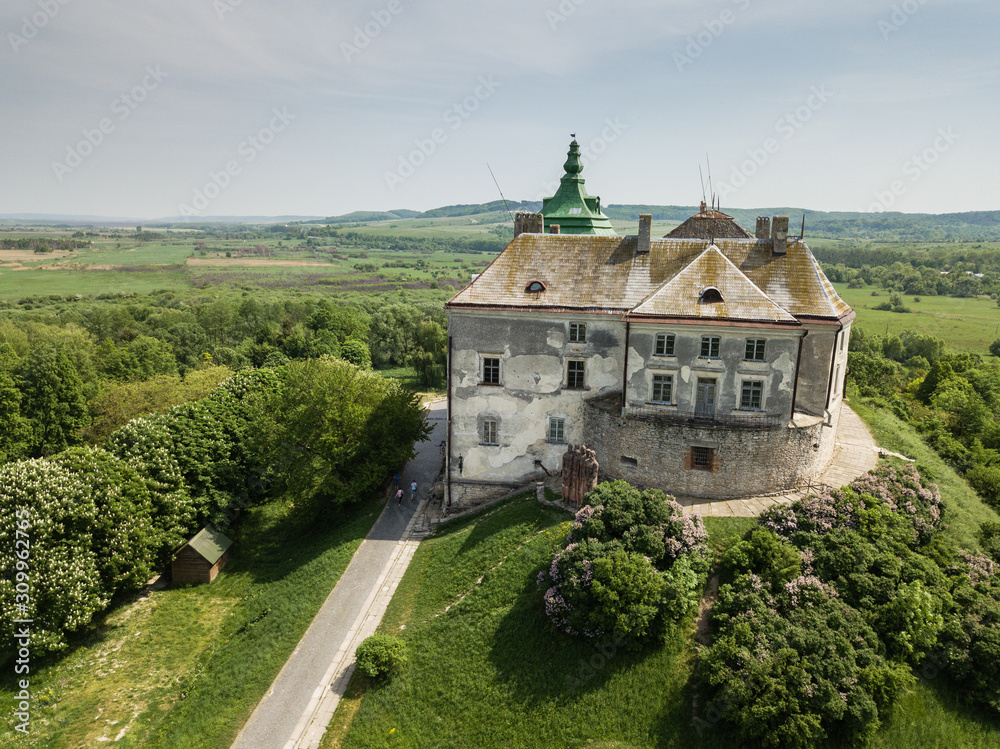Aerial view frome drone to historic castle and park in Olesko, Lviv region, Ukraine