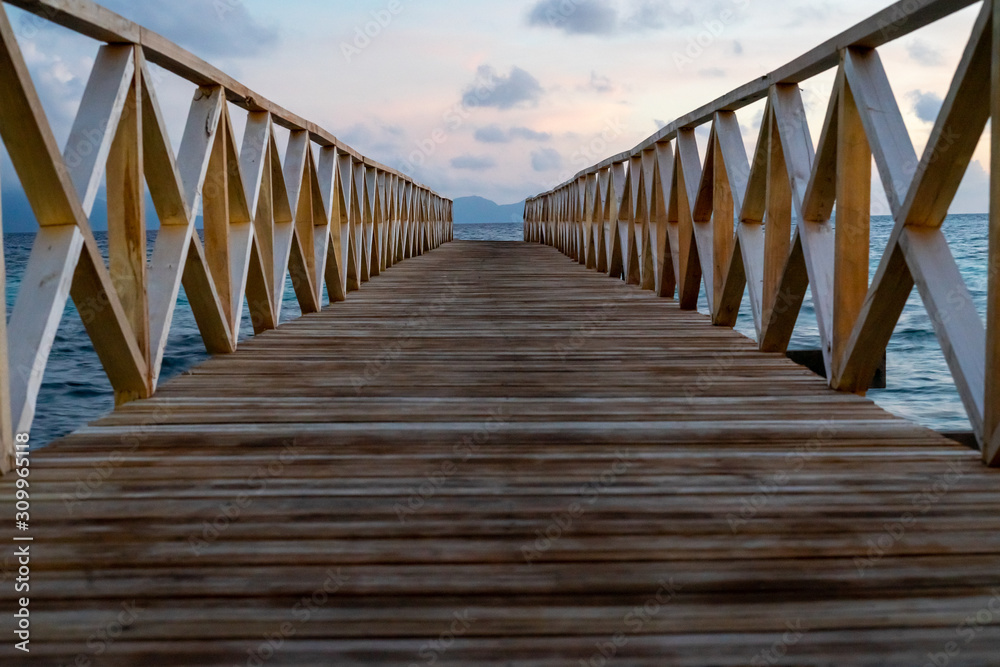 Wooden bridge during the sunset near the Bum bum island in Semporna, Borneo Sabah. Wooden bridge during the sunset near the Bum bum island in Semporna, Borneo Sabah.