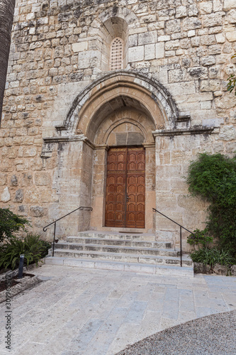 Entrance doors to the Benedictine Abbey of Abu Gosh in the Chechen village Abu Ghosh near Jerusalem in Israel
