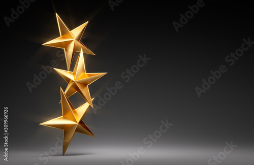 Three golden Stars with dark Background - Copy Space photo