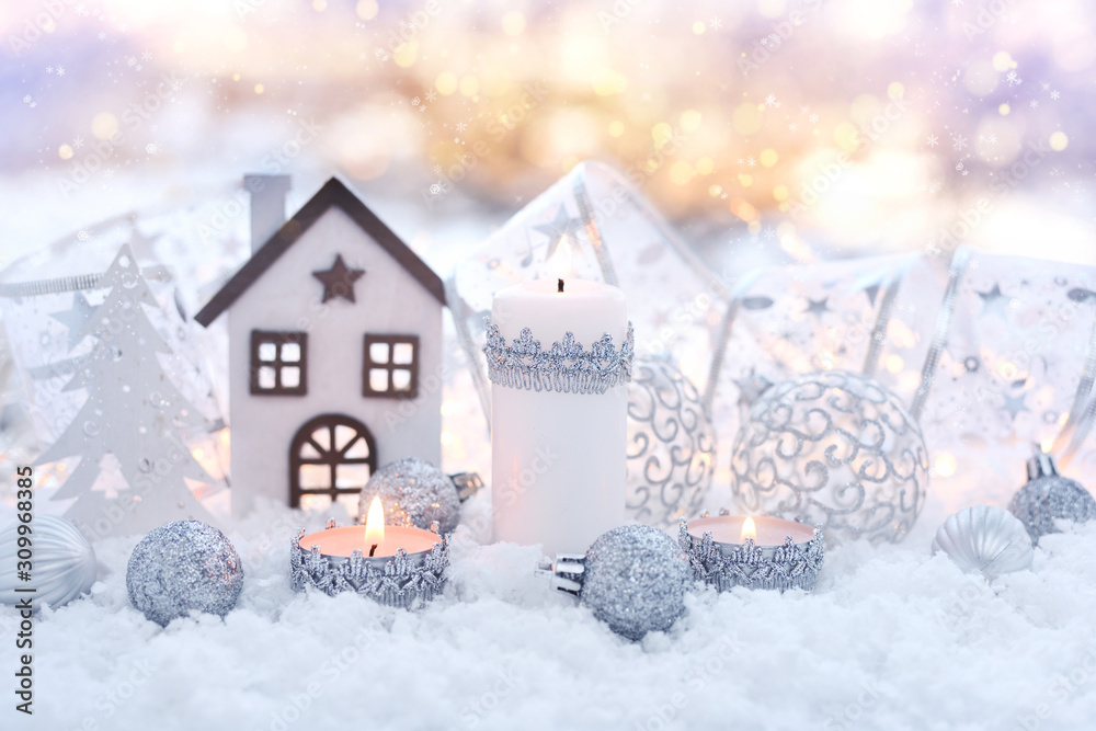 Christmas composition with candles and festive decorations оn the snow. Christmas or New Year greeting card. Christmas composition with candles and festive decorations оn the snow. Christmas or New Year greeting card.