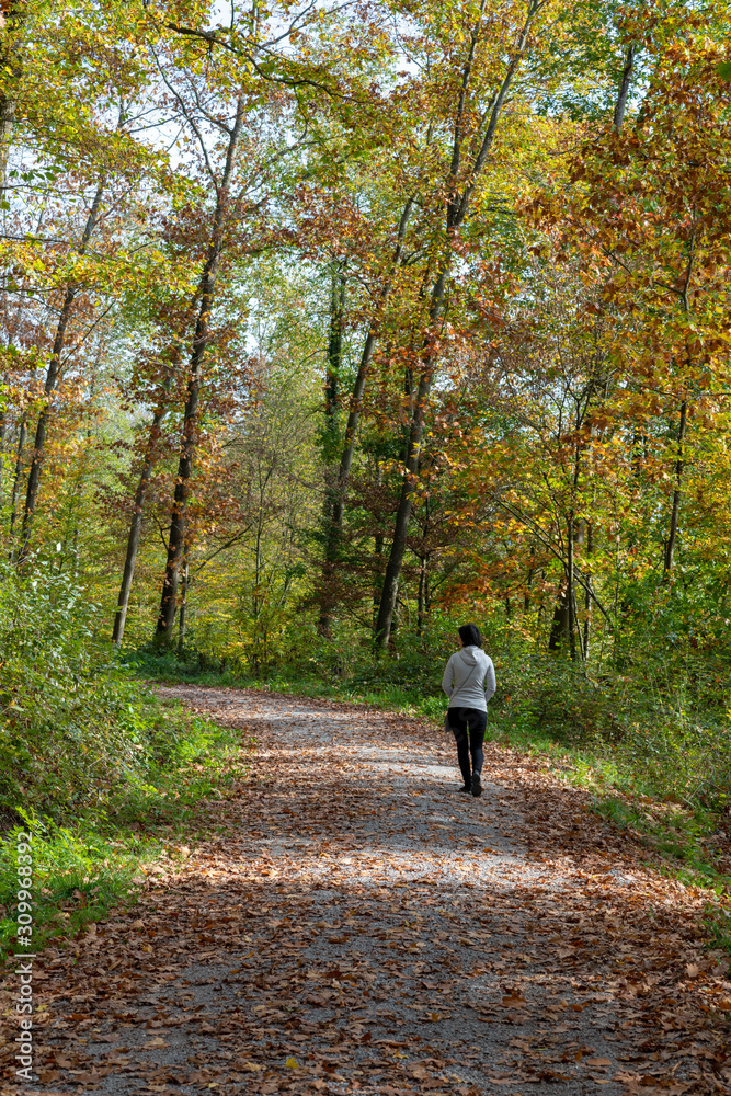 young woman walking in the park