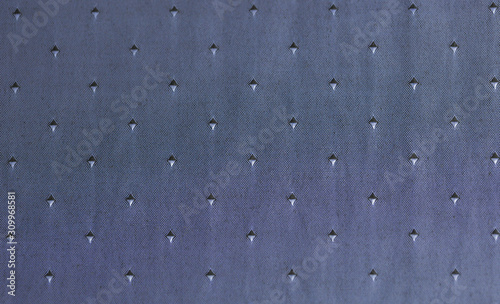 image of fabric texture on a lit background of different colors