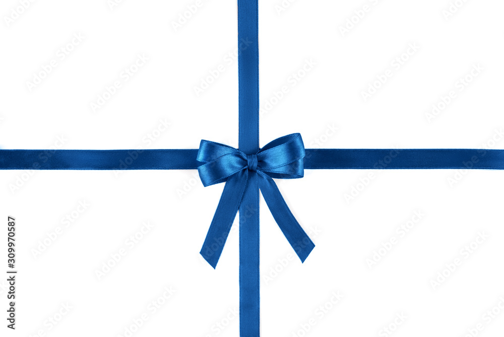 Shiny blue silk ribbon isolated on white background. Festive concept. Flat lay. Shiny blue silk ribbon isolated on white background. Festive concept. Flat lay.