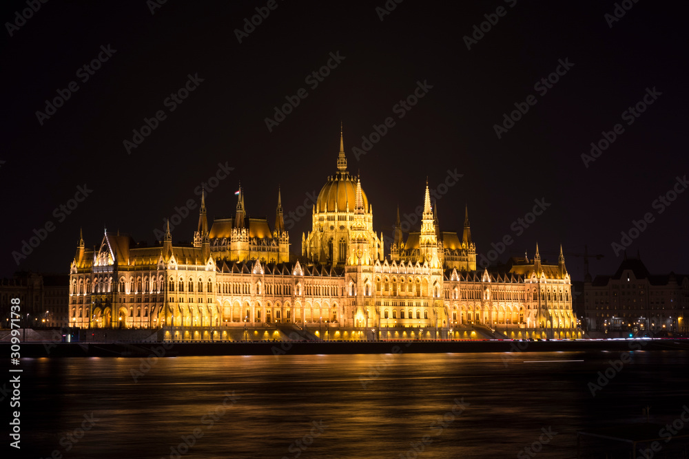 View of the Hungarian Parliament building at night. Capital city Budapest.