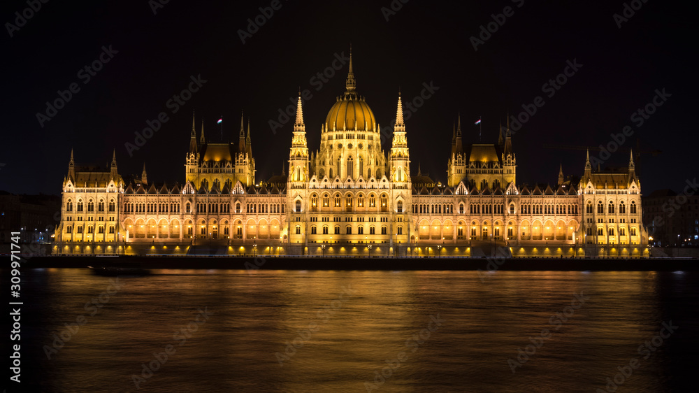 View of the Hungarian Parliament building at night. Capital city Budapest.