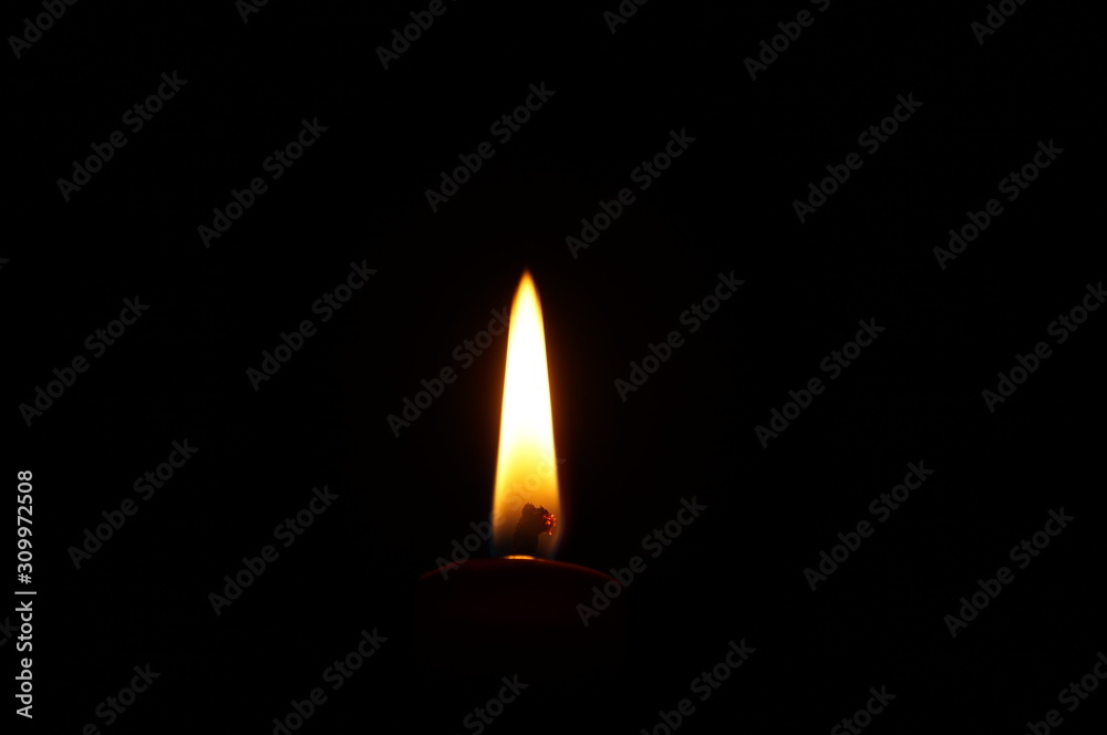 Candle flame on black background. Flame alone. Candle flame on black background. Flame alone.