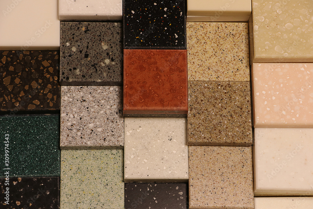 Top view of color samples stone  on oak wood table, Acrylic Solid Surface
