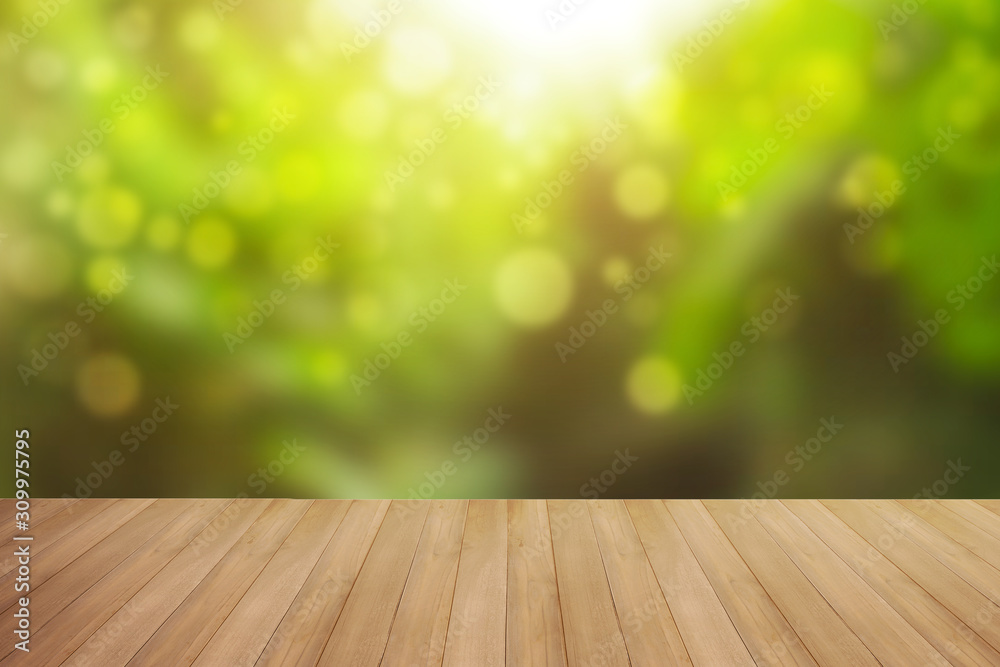empty wooden table and green background empty wooden table and green background